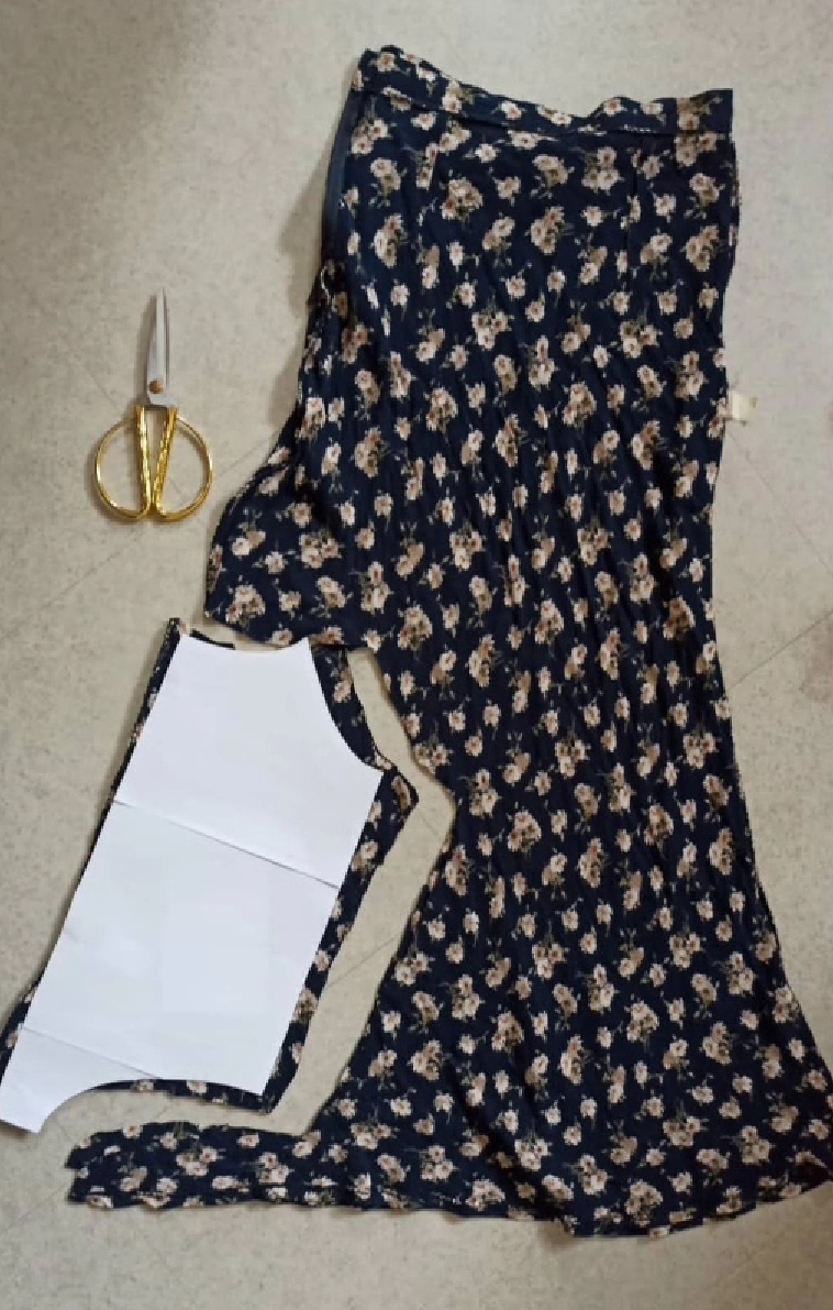 Upcycled romper from a skirt